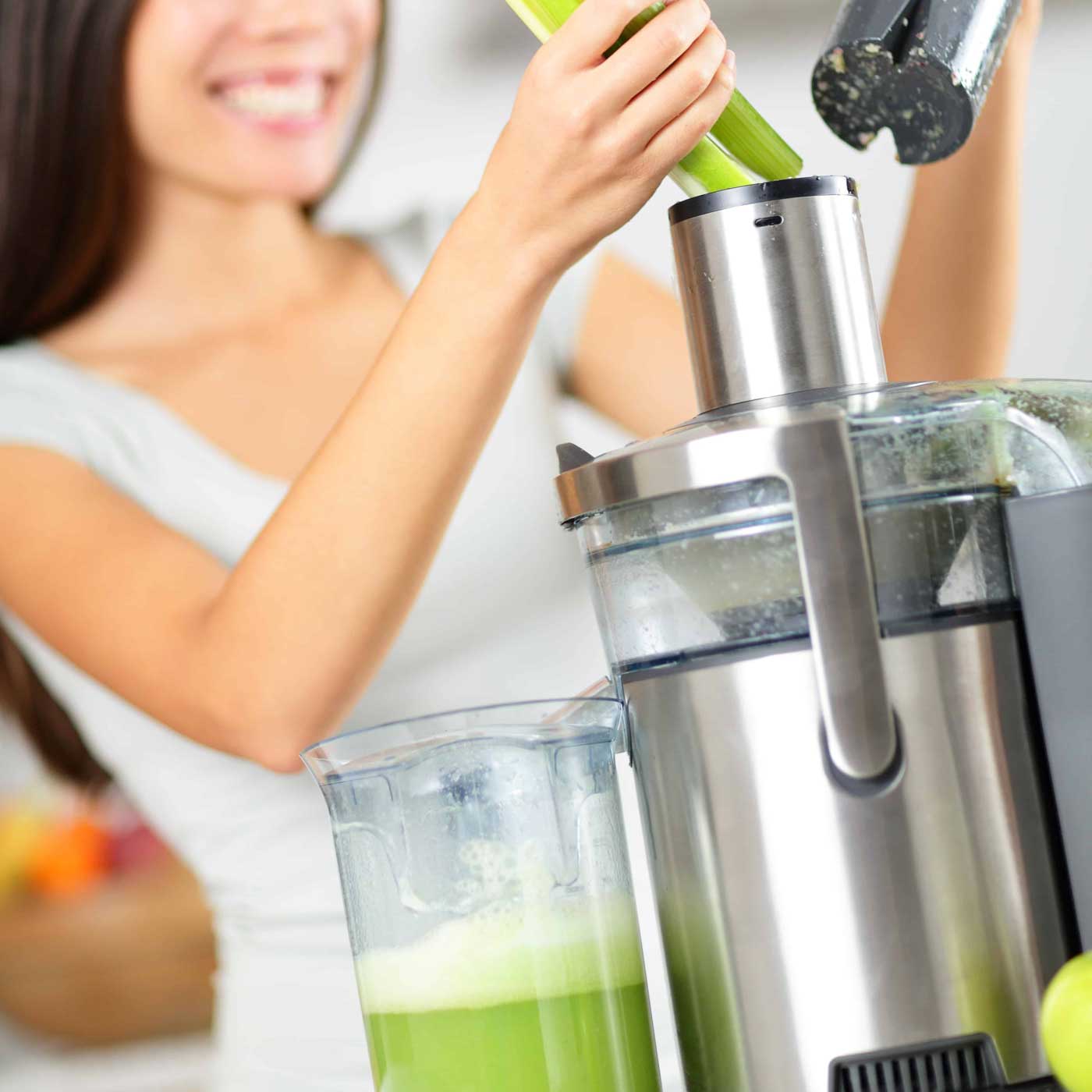Essential Chiropractic and Healthcare Clinic - Detox and Weight Management Program Girl Doing Juice
